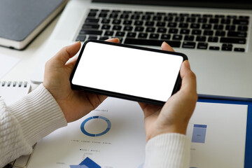 Mock up Image or Cropped shot of business woman hand holding blank screen,empty screen for mockup image or advertisement.