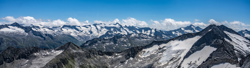 Alpnine rocky peaks panorama on sunny summer day. Austrian Alps, Austria