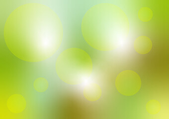 Fototapeta na wymiar 黄緑色のグラデーションと水玉模様