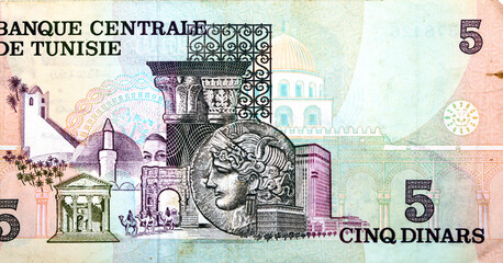 Reverse side of 5 five Tunisian dinars banknote issued 1973 by the central bank of Tunisia with multiple scenes of Tunisian culture and history: mosaics, minaret, column, domed mosque and Collage
