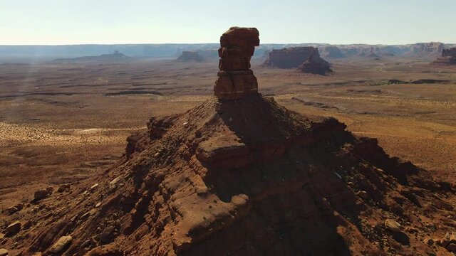 Cinematic aerial shot of sandstone formations in Valley of the Gods in Utah