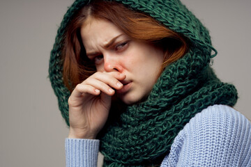 red-haired woman flu infection virus health care light background