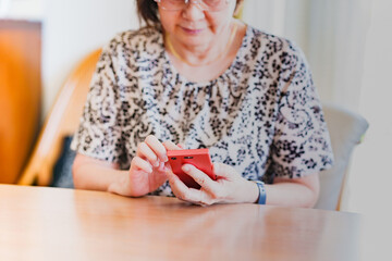 Japanese senior woman using smart phone