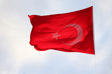 Turkish flag waving in the sky.