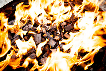 burning charcoal for shish kebabs wood coals ash burning coals in the grill shish kebabs recreation...