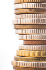 Coin stack isolated on white. Concept finance and accounting. Focus on coins edge