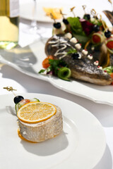 Traditional banquet dish stuffed fish with vegetables. Delicatessen fish pike for dinner party, wedding, holiday. Contemporary banquet menu, catering, serving for festive table.