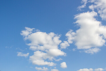 Naklejka na ściany i meble blue sky with white clouds natural background