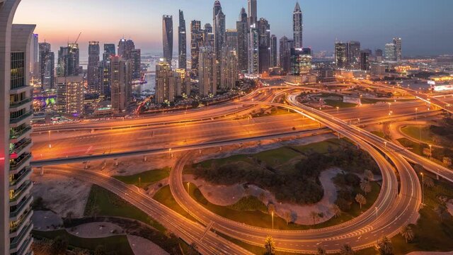 Dubai Marina highway intersection spaghetti junction day to night timelapse