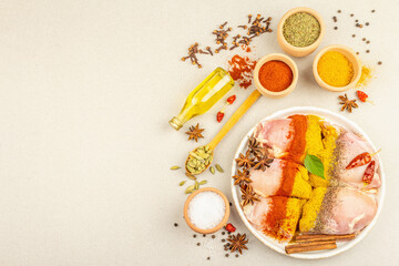 Chicken and curry spices. Set of raw ingredients for cooking traditional food