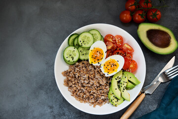 Buddha bowl with vegetables, buckwheat tomatoes and avocado, healthy food, copy space