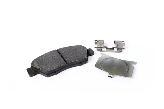 Brake pad and shim plate of car brake part in white background