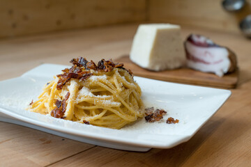 Bucatini alla gricia, traditional Italian pasta based on guanciale (cured pork cheek), pecorino cheese, and black pepper