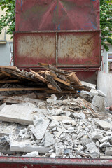Gravel stones or rocks, mounds for construction and brown dirt in a container