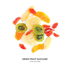 Creative layout made of sweet fruit candy succade on the white background. Food concept. Macro...