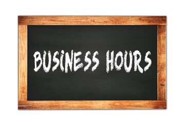 BUSINESS  HOURS text written on wooden frame school blackboard.