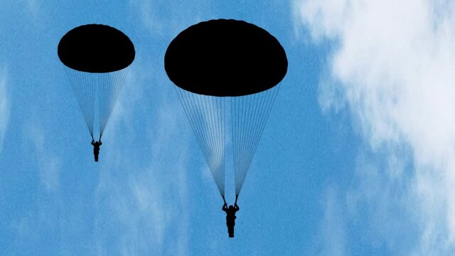 Two Paratroopers in the sky. Paratroopers landing. 