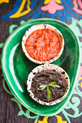 Harissa tomato paste and black olives paste. Appetiser, Morocco
