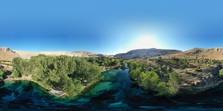 Gorgeous Gökpınar pond with its clear turquoise water and underwater plants in green nature, 360 VR Virtual reality angle aerial view.  Sivas - Gürün TURKEY