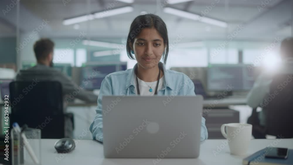 Aufkleber Diverse Office: Portrait of Beautiful Indian IT Programmer Working on Desktop Computer, Smiling and Looking at Camera Kindly. Female Software Engineer Creating Innovative App, Program, Video Game
