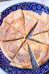 Moroccan whole wheat flatbread with honey, breakfast, Essaouira, Morocco