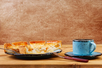 Homemade pie with apples and peaches on wooden table. Copyspace.