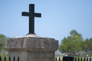 Old stone cross in cemetery