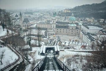 Fototapeta premium View of winter Salzburg view of the city center salzburg austria winter river in salzburg