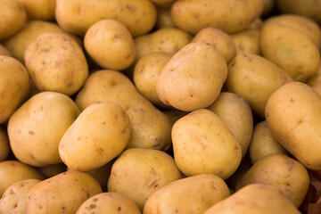 potatoes on counter in market