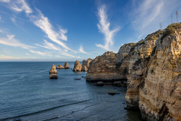 Beautiful beach of Dona Ana, located in Lagos - Algarve, Portugal. One of the most beautiful beaches of the Algarve - Portugal. Beach with huge cliffs and rocky formations in the ocean