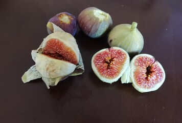 figs ripe cut and whole top view on table
