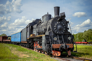 Fototapeta na wymiar old steam train. Ukrzaliznytsia. The train of the last century. Freight train