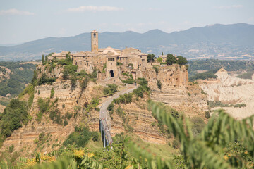 Fototapeta na wymiar Civita di Bagnoregio (dying city)old town in the Province of Viterbo in central Italy. Tourist town on the mountain