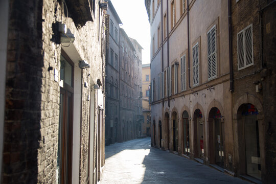 Fototapeta Romantic streets in the old Italian city of Siena historic town in Italian Tuscany