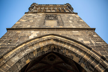 Ancient church tower architecture built of stones. Construction. Medieval construction technique. Temples and churches.