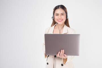 Customer service operator woman in suit wearing headset over white background studio.