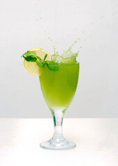 cocktail with lime and mint