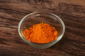 Tumeric powder in the bowl