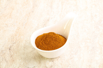 Dry Paprika powder in the bowl