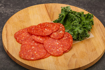 Italian spycy pepperoni sausage slices