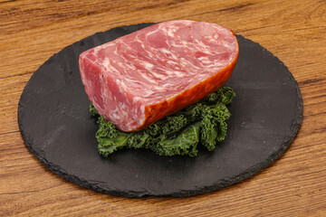 Beef ham piece over board