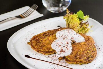 MUCVER. Traditional Turkish Zuccini Mucver. Mucver is a Turkish fritter or pancake, made from grated zucchini.