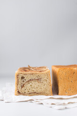 Small homemade white bread with a cinnamon swirl inside