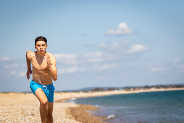 Running on a beach next to the sea
