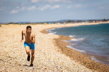 Running on a beach next to the sea