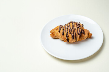 Croissants with strawberries and chocolate. High quality photo