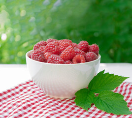 Raspberries in the garden.Fresh organic raspberries .Healthy eating, diet . Selective focus.