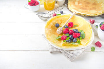 Crepes pancakes with berries