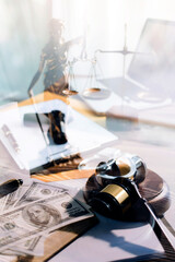 justice and law concept.Male judge in a courtroom on wooden table and Counselor or Male lawyer working in office. Legal law, advice and justice concept.