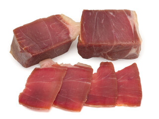 Spanish ham jamon , hand cut, sliced on a white